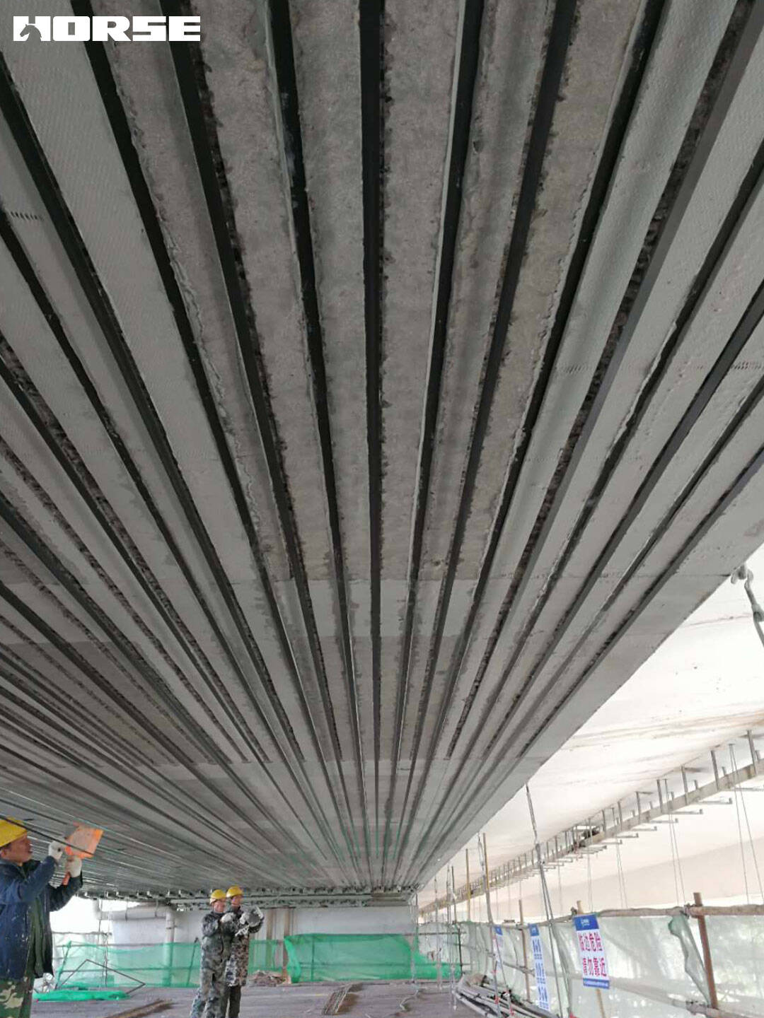 Bridge reinforcement using carbon fiber laminate Bridge reinforcement using carbon fiber laminate
