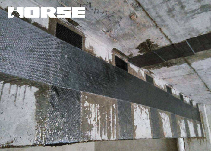 Repair of reinforced concrete beams using carbon fiber reinforced polymer Repair of reinforced concrete beams using carbon fiber reinforced polymer
